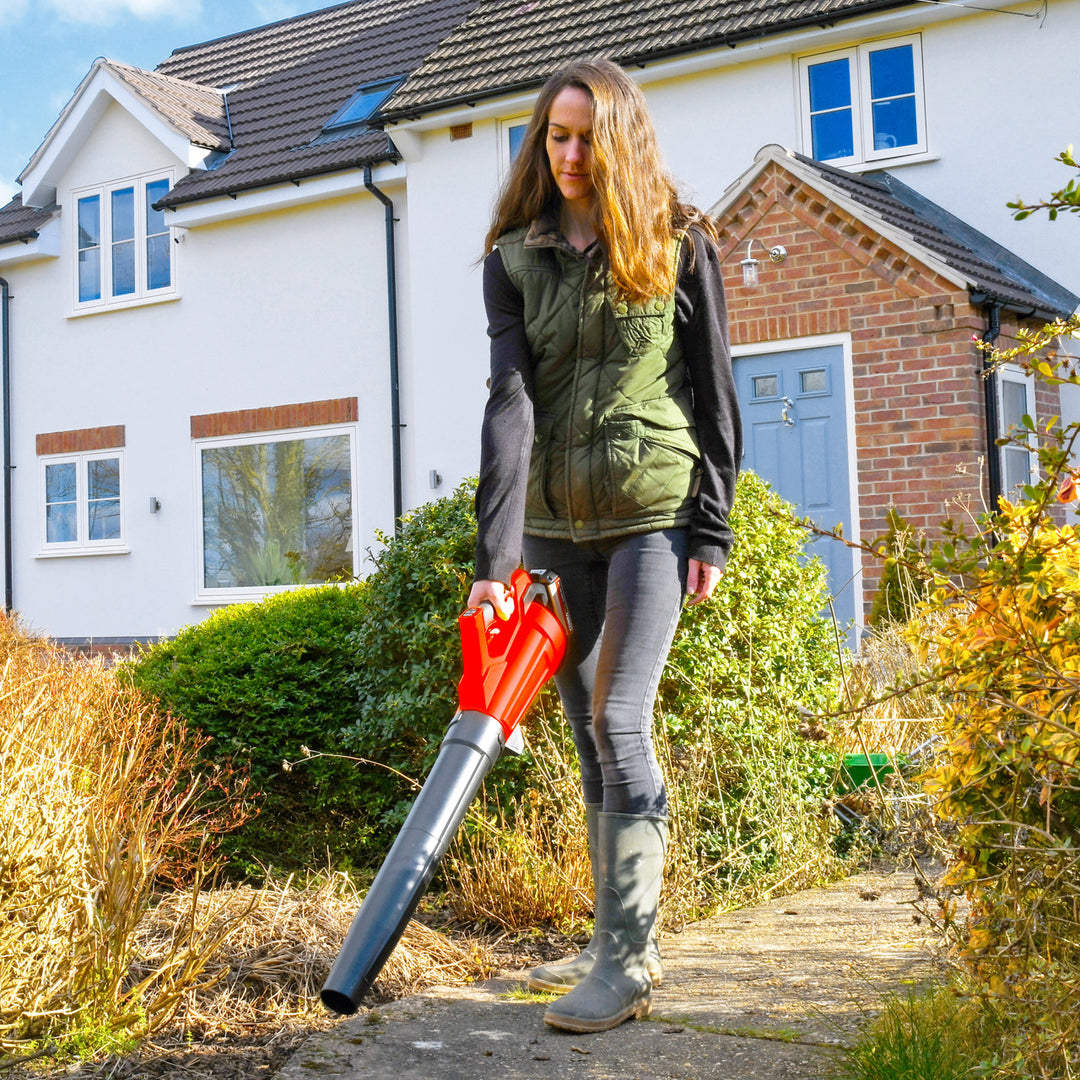 Cobra LB45024V leaf blower clearing leaves